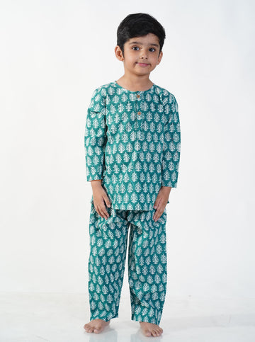kid wearing pure cotton hand block printed green leaf pajama set
