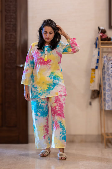 woman wearing pure cotton hand block printed multi tie and dye pajama set 