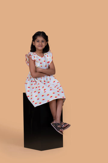 girl wearing pure cotton sun printed dress