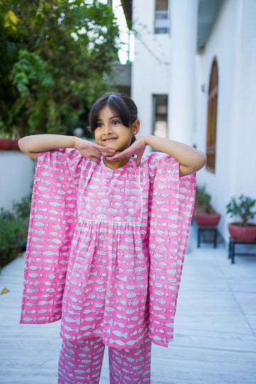 girl wearing pure cotton pink fish printed kaftan set