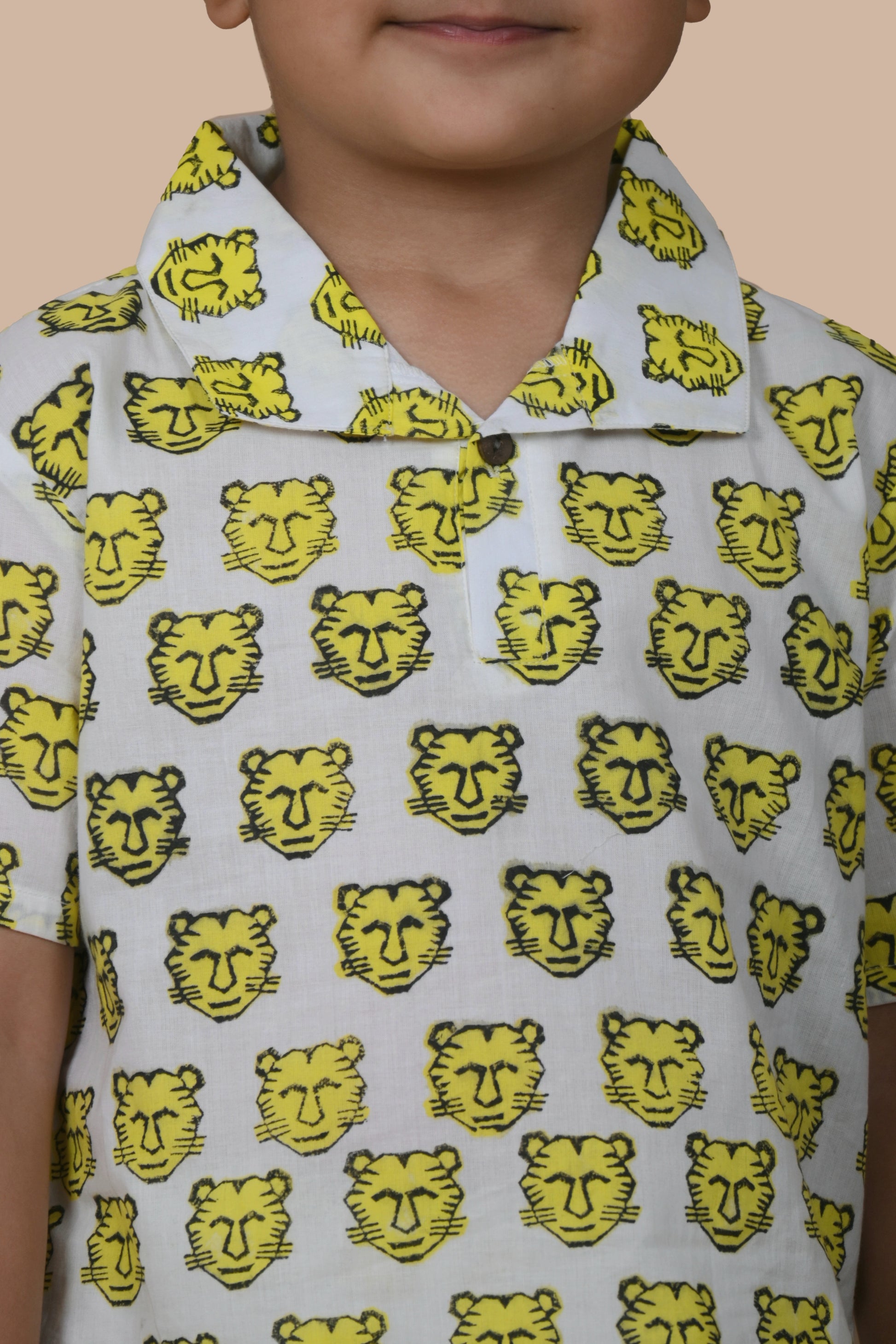 Close-up of Yellow Tiger hand block print on pure cotton fabric, Chheent Jaipur craftsmanship