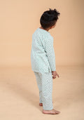 Boy wearing green booti hand block printed cotton pajama set- back view