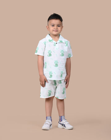 Boy wearing pure cotton Green Cat hand block printed shorts and top set by Chheent Jaipur