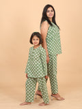 Mother daughter matching nightwear green elephant - full length view