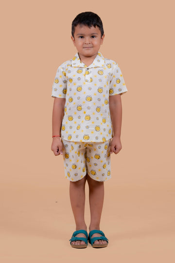 Boy wearing pure cotton Honey Bee hand block printed shorts and top set by Chheent Jaipur