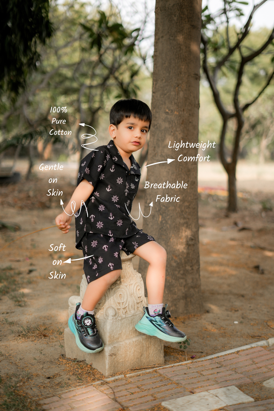 Boy wearing pure cotton Black Anchor hand block printed shorts and top set by Chheent Jaipur