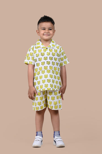 Boy wearing pure cotton Yellow Tiger hand block printed shorts and top set by Chheent Jaipur