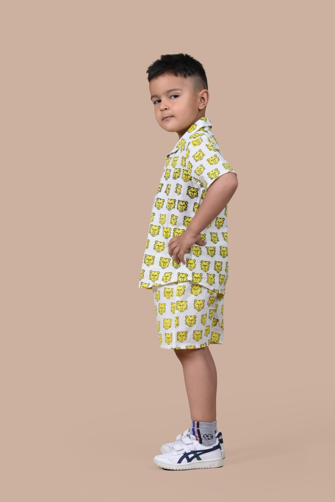 Boy wearing pure cotton Yellow Tiger hand block printed shorts and top set by Chheent Jaipur