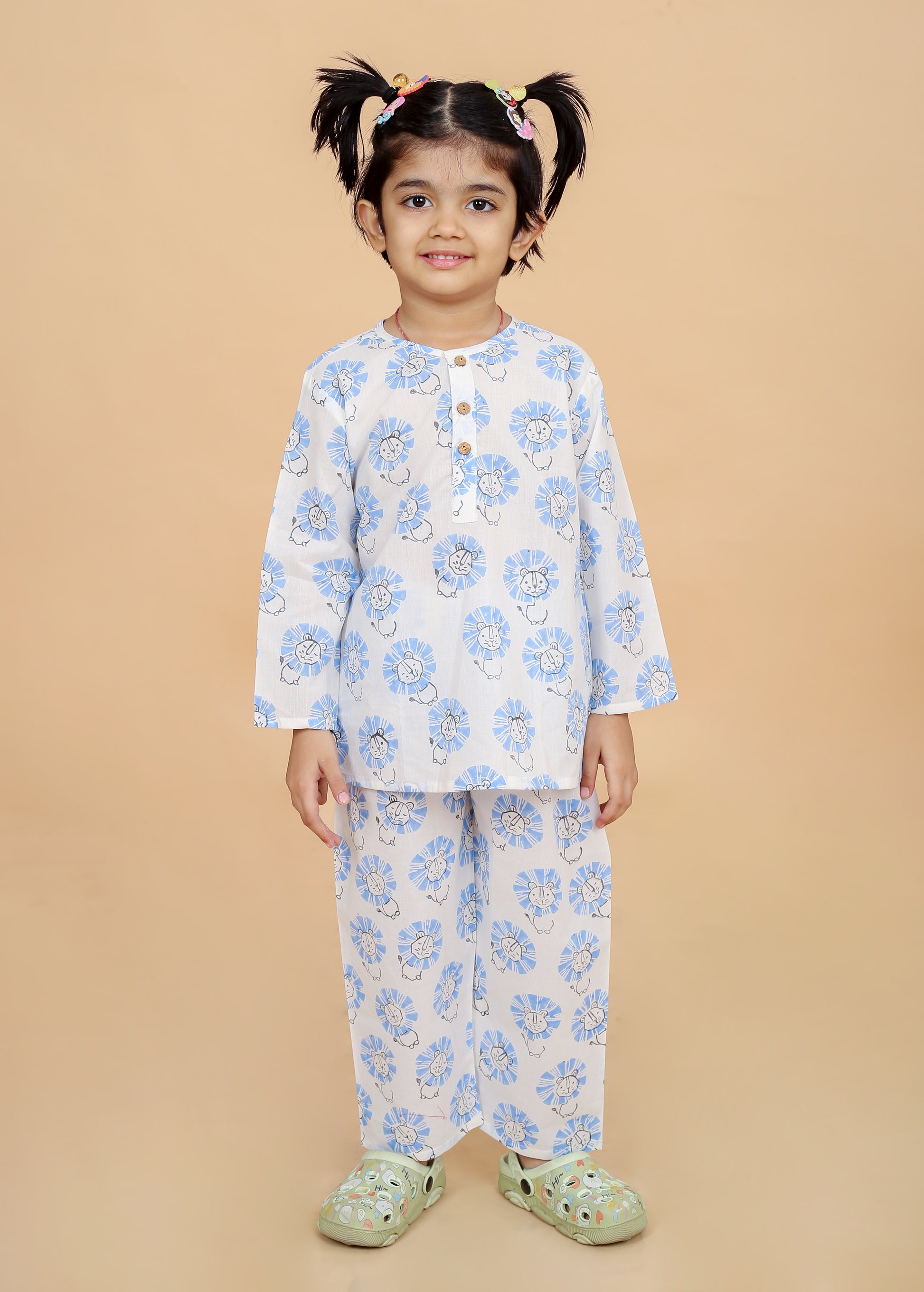 girl wearing pure cotton blue lion hand block printed nightsuit