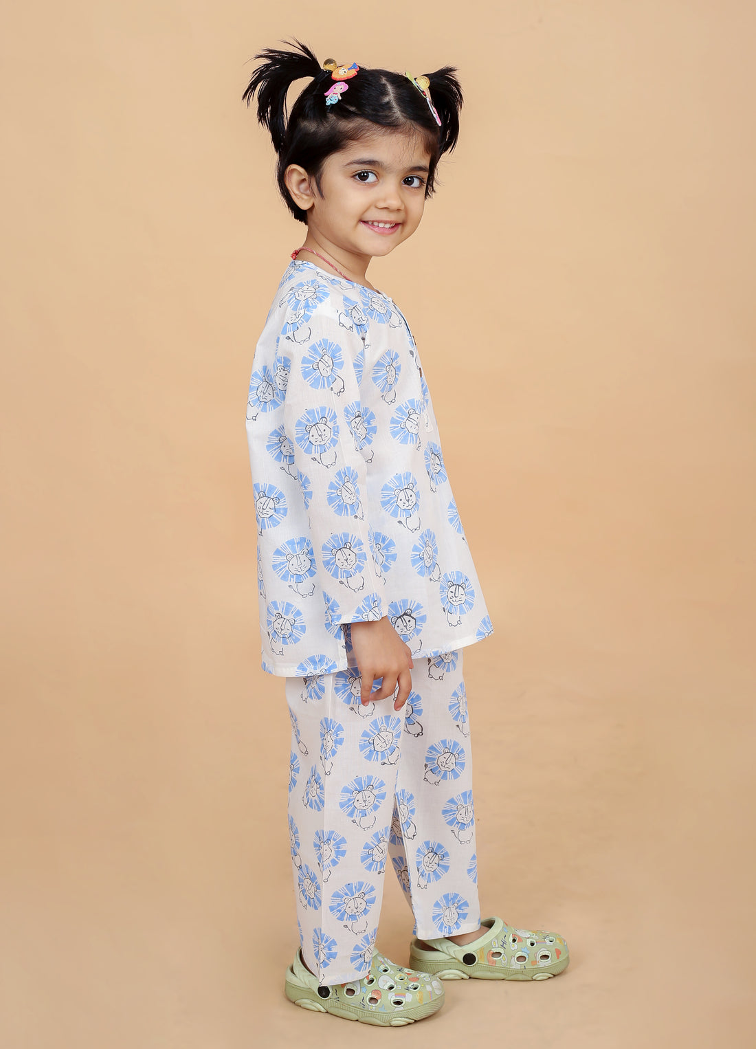 girl wearing pure cotton blue lion hand block printed nightsuit