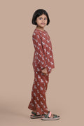 Child wearing a brown deer patterned outfit 
