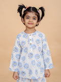 girl wearing blue lion printed nightsuit