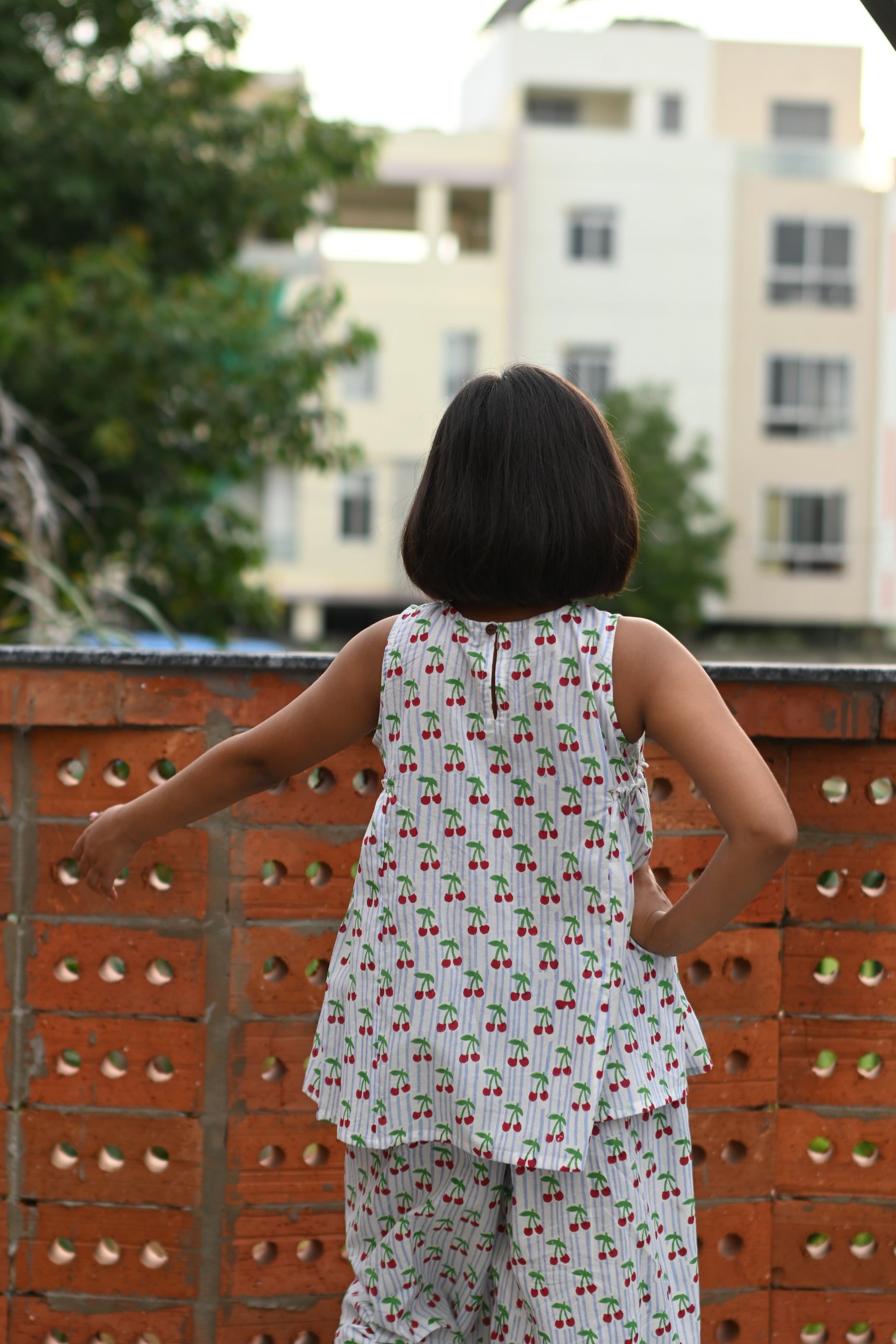 Cherry print pure cotton culottes set for girls, back view outdoors – Chheent Jaipur