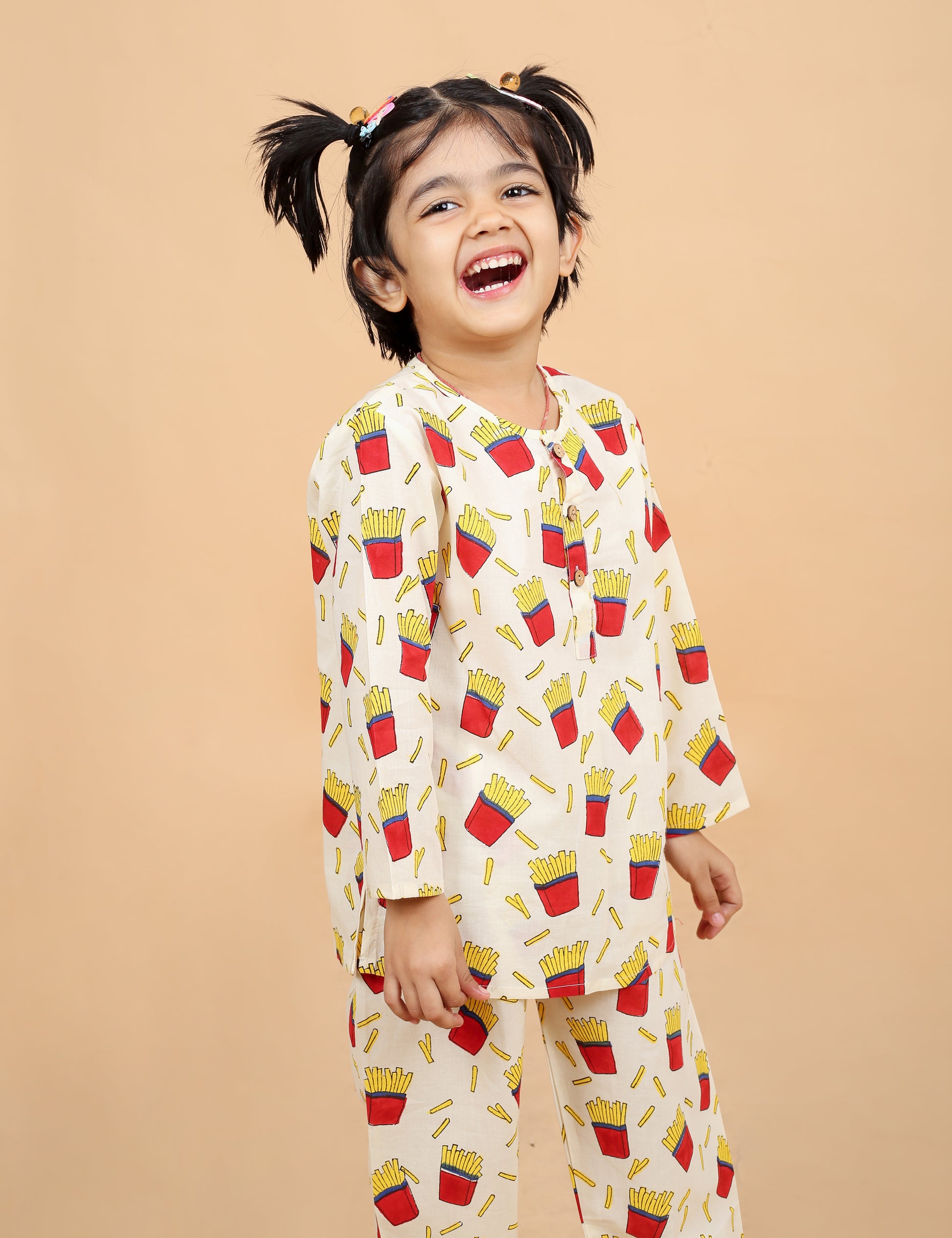 girl wearing pure cotton french fry nightsuit