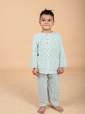 Boy wearing green booti hand block printed cotton pajama set- front