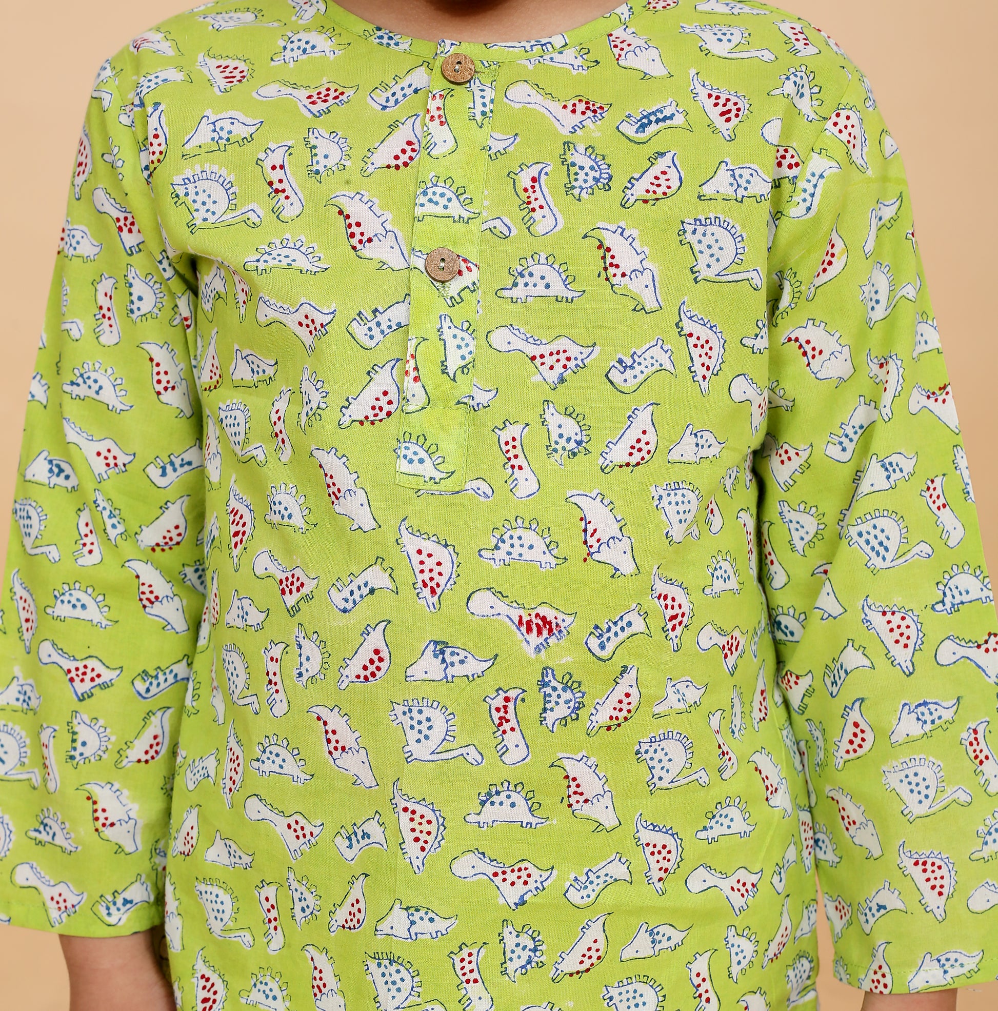 Green Dino pajama set fabric close-up - pure cotton hand block printed