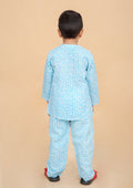 Boy wearing turquoise leopard pajama set,  poseack