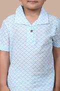 Close-up of Turquoise Scallops hand block print on pure cotton fabric, Chheent Jaipur craftsmanship