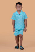 Boy wearing turquoise elephant print cotton shorts and top set