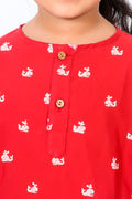 Girl wearing hand block printed red whale cotton night suit close up
